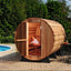 Custom - made outdoor barrel - shaped sauna for 4 - 6 people. It is a steam sauna made of Canadian red cedar, equipped with an electric heater and sauna stones.