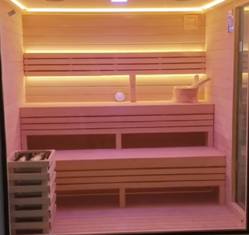 Outdoor square - shaped sauna. A Canadian fir/red cedar cube - shaped sauna equipped with two - layer benches and light strips.