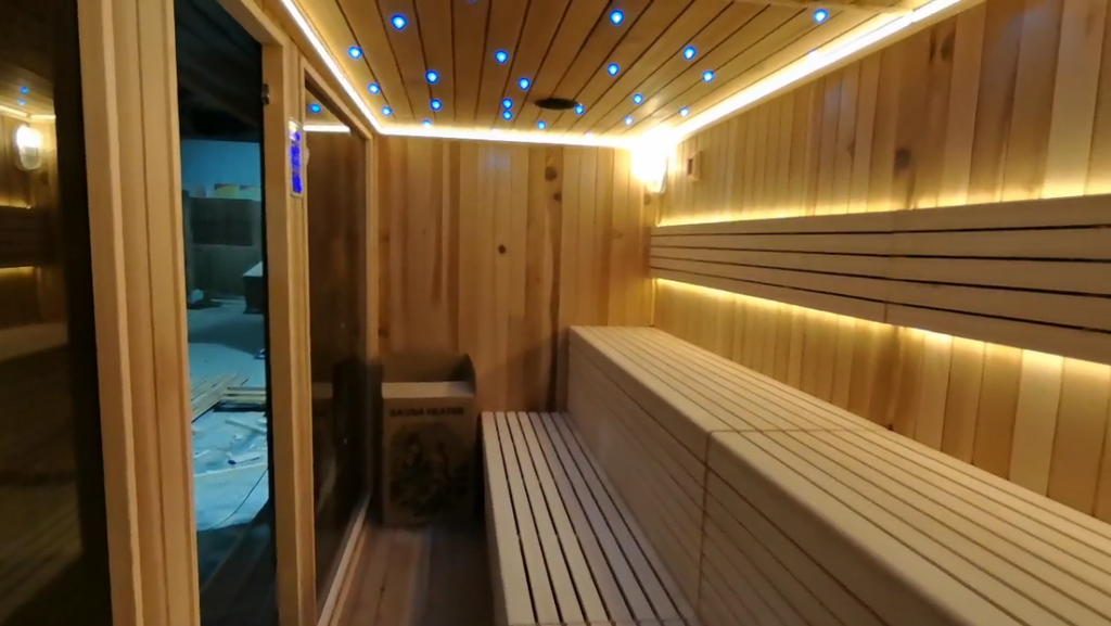 Custom - sized outdoor sauna. It can accommodate 4 - 6 people, is made of red cedar, features far - infrared function, and is environmentally friendly.
