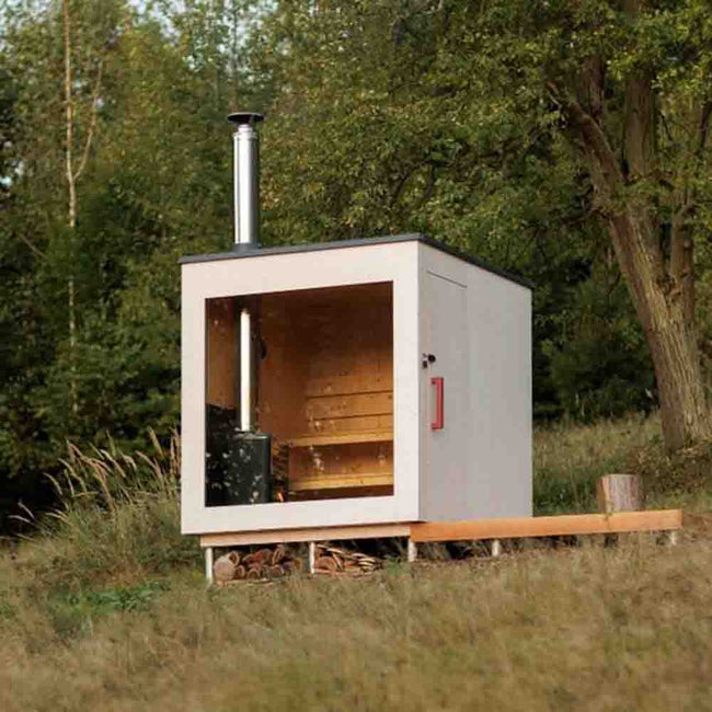 A modern - designed bathroom cedar sauna with a square fir cube shape, heated by an electric furnace. Hover Image