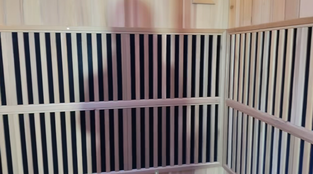 Custom - made pointed - roof far - infrared light - wave sauna room with a built - in independent shower area. It is a sweat - steaming house suitable for both indoor and courtyard use, and the style and size can be customized as required.
