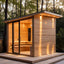 New - style Modular Square Modern Electric Outdoor Sauna. All - weather Durable Type. For 3 - person use. Made of red cedar with detachable benches. Features intelligent digital control.
