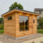 Outdoor sauna for 6 - 8 people. Black, waterproof, square - shaped wooden sauna for wholesale. Suitable for gardens and villas