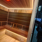 Outdoor courtyard square infrared sauna. An integrated sweat - steaming house in the open - air garden, which is waterproof and customizable in size.