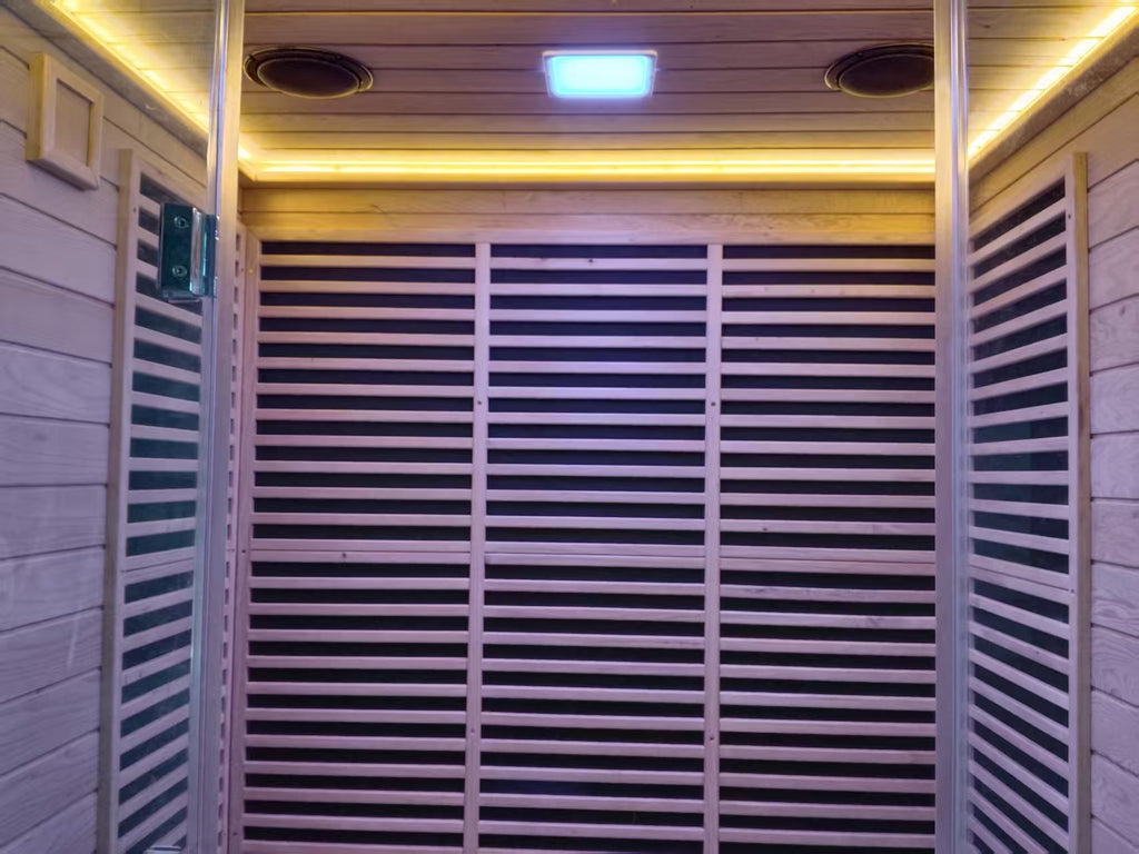 Modern square - shaped villa outdoor sauna made of dawn redwood, featuring full - spectrum infrared and red - light therapy, a digital control panel, and a steam indoor sauna function.