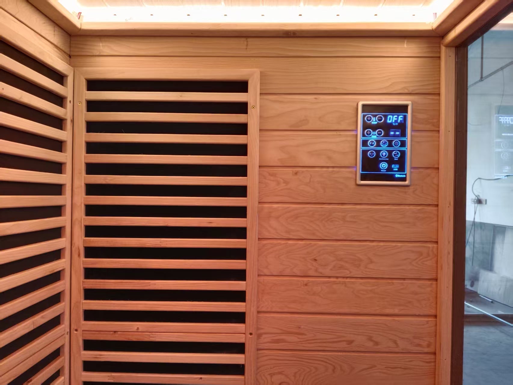 Modern square - shaped villa outdoor sauna made of dawn redwood, featuring full - spectrum infrared and red - light therapy, a digital control panel, and a steam indoor sauna function.