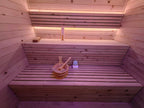Custom - made pointed - roof electric - furnace sauna, a traditional electric - furnace constant - temperature sweat - steaming room, customized for outdoor courtyard use and controlled by a control panel.