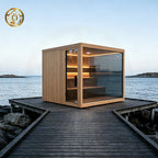 Luxurious 6 - person outdoor black square - shaped sauna. Made of spruce, in a cube shape, equipped with a 6KW heater and LED lights, suitable for use in an outdoor spa.