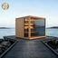 Luxurious 6 - person outdoor black square - shaped sauna. Made of spruce, in a cube shape, equipped with a 6KW heater and LED lights, suitable for use in an outdoor spa.
