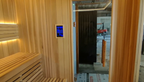Outdoor luxury modern far - infrared sauna room, equipped with a shower room, waterproof. It is heated by an electric furnace with sauna stones and controlled by a control panel, suitable for use in the backyard garden.