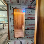 Outdoor luxury modern far - infrared sauna room, equipped with a shower room, waterproof. It is heated by an electric furnace with sauna stones and controlled by a control panel, suitable for use in the backyard garden.