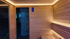 High - end Outdoor Sauna for Four People. It is a square - shaped, cube - structured sauna with a light box, representing a traditional outdoor sauna.