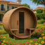 Backyard wooden barrel - shaped sauna, an outdoor round cabin. It is used for hot spring vacations, heat therapy, steam experiences, and traditional saunas. The interior is equipped with an electric furnace, accessories, etc.