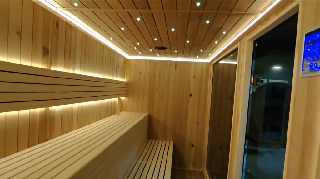Custom - sized outdoor sauna. It can accommodate 4 - 6 people, is made of red cedar, features far - infrared function, and is environmentally friendly.