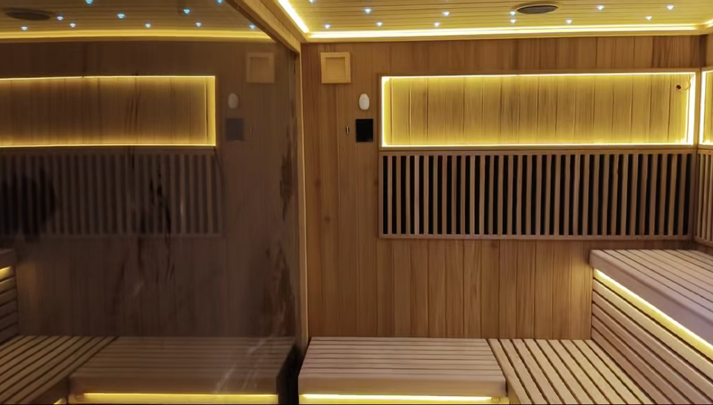 Large multi - compartment combined sauna. A split - type customized sweat - steaming wooden house for villa courtyards, heated by an electric furnace with sauna stones, controlled by a control panel. It is an outdoor sauna.