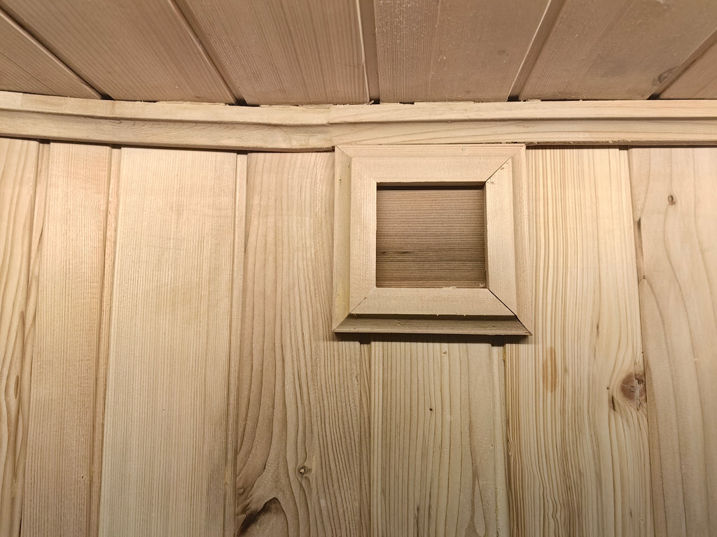 Custom - made newly - designed square cube - shaped outdoor sauna made of Canadian red cedar, equipped with infrared heating