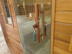 A stylish outdoor sauna cube with a wet - steam function, a computer control panel, made of western red cedar, suitable for 4 - 5 people.