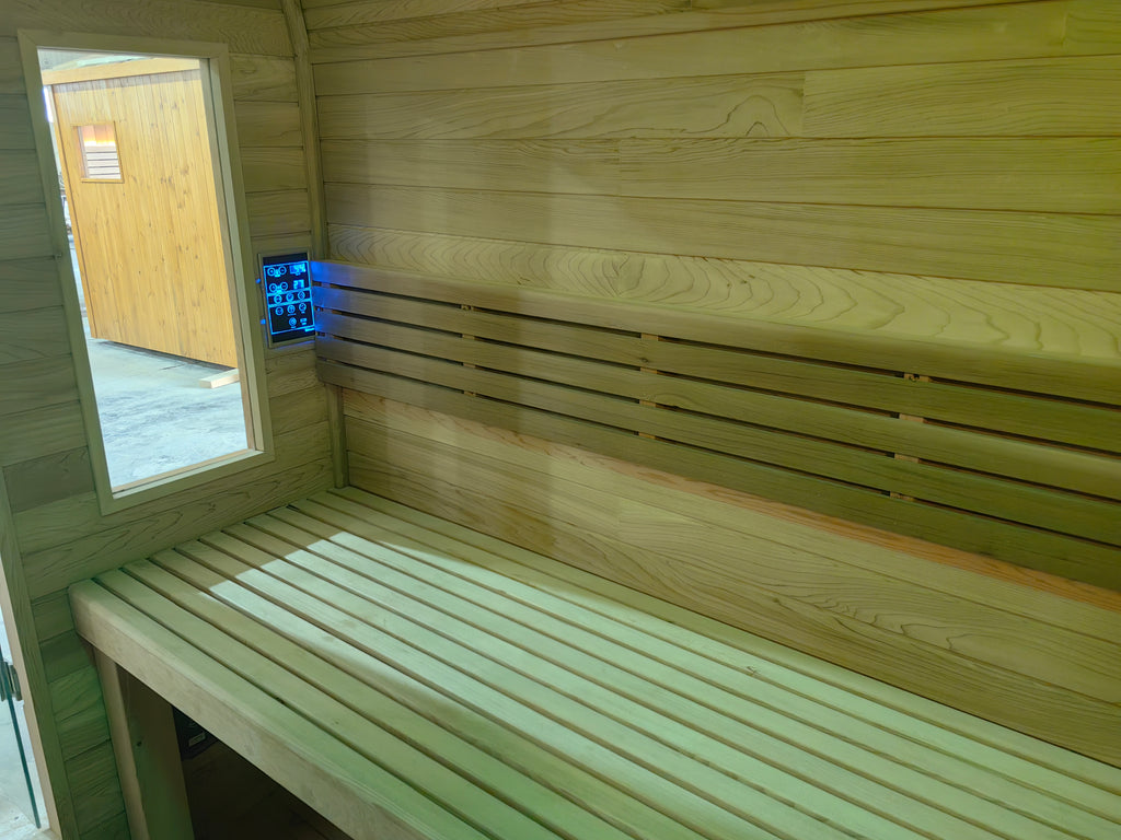A stylish outdoor sauna cube with a wet - steam function, a computer control panel, made of western red cedar, suitable for 4 - 5 people.