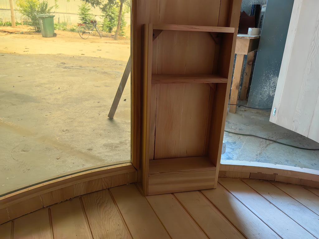 Customize an outdoor barrel - shaped sauna for 4 - 6 people. It is a Canadian red cedar wood steam sauna with a terrace, equipped with an electric heater and sauna stones.