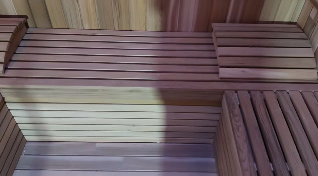 Custom - made pointed - roof far - infrared light - wave sauna room with a built - in independent shower area. It is a sweat - steaming house suitable for both indoor and courtyard use, and the style and size can be customized as required.