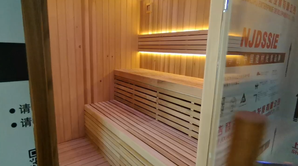 Outdoor luxury modern far - infrared sauna room, equipped with a shower room, waterproof. It is heated by an electric furnace with sauna stones and controlled by a control panel, suitable for use in the backyard garden.