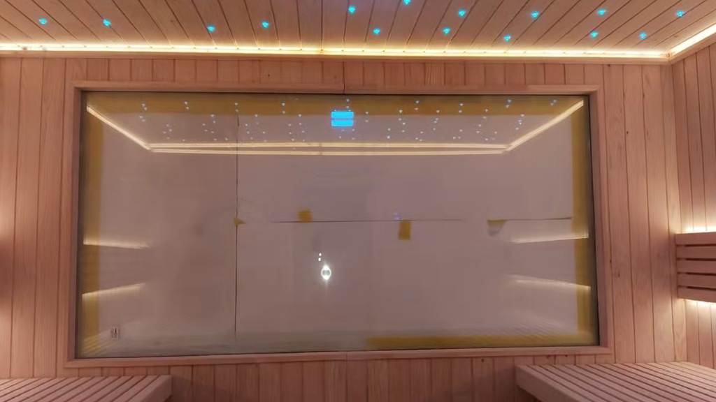 Custom - made square solid - wood sauna room. It uses an electric - furnace for constant - temperature heating and serves as a home - use indoor dry - steaming room. The size can be adjusted as required for villas and homestays.