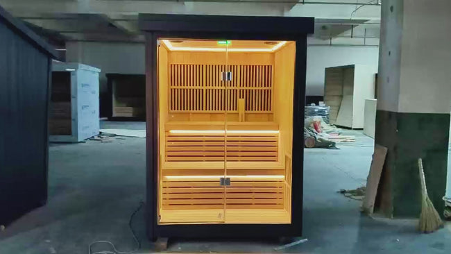 Modern square - shaped villa outdoor sauna made of dawn redwood, featuring full - spectrum infrared and red - light therapy, a digital control panel, and a steam indoor sauna function. Hover Image