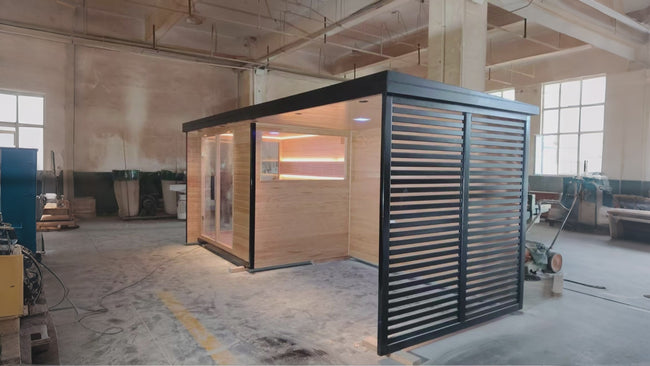 Traditional outdoor sauna room suitable for 2 - 6 people. It's a slatted sauna room for dry - steaming, made of wood, equipped with Bluetooth music function and an electric furnace. Hover Image