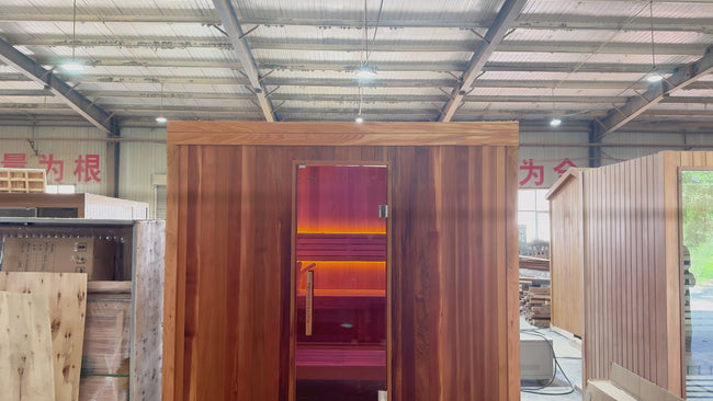 Luxury modular square - shaped red - cedar electric - heated sauna. It features a modern Nordic design, can accommodate 4 people, is detachable, and comes with a computer control panel. Hover Image