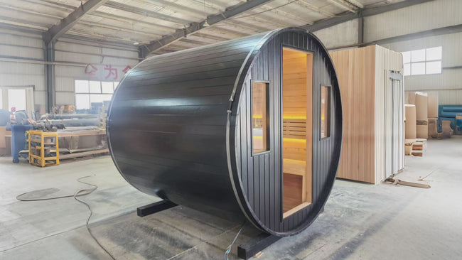 Outdoor sauna barrel. It is made of wood, has an electric furnace and windows, is cube - shaped, suitable for four people to use, and is suitable for small spaces. Hover Image